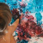 A child finger painting