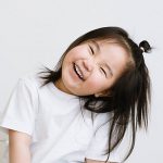 A little girl laughing