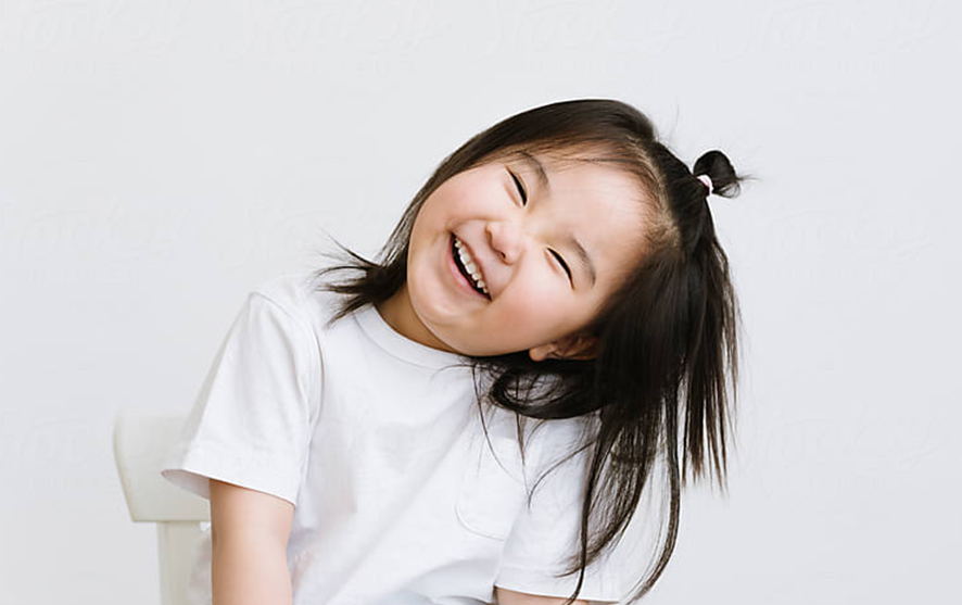 A little girl laughing