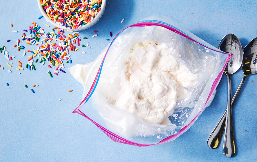 Ice cream in a bag and sprinkles in a bowl next to it