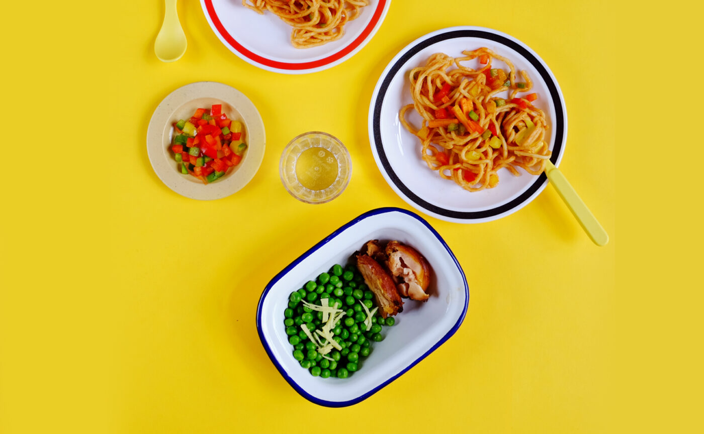 Red curry noodles with chicken and ginger peas