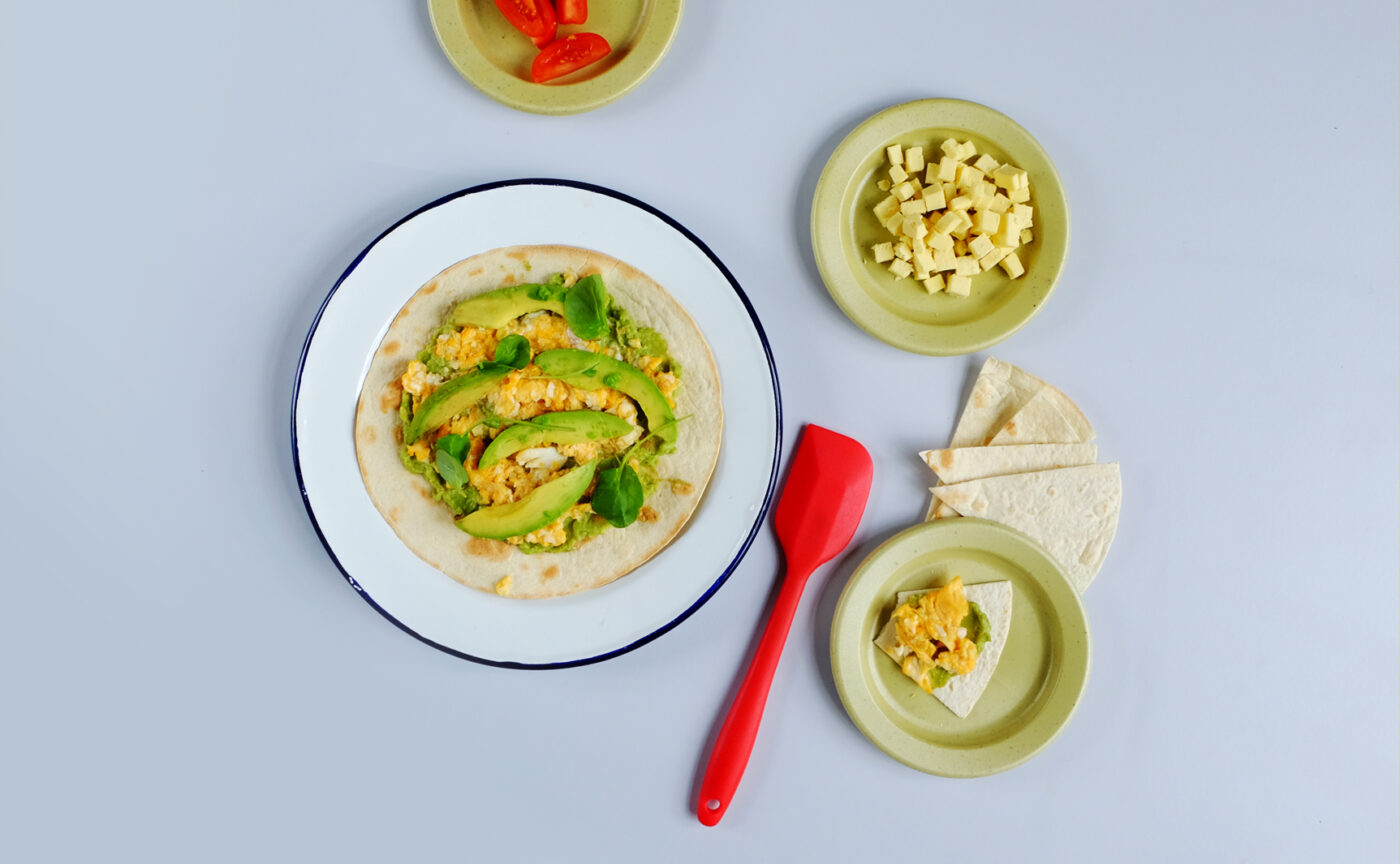 Scrambled egg and avocado on wholemeal tortillas