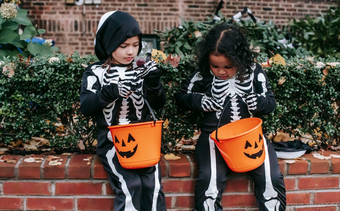 Halloween trick or treating with children